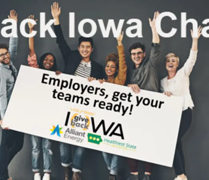 Give Back Iowa Challenge, with a group of adults holding a sign saying Employers, get your teams ready!